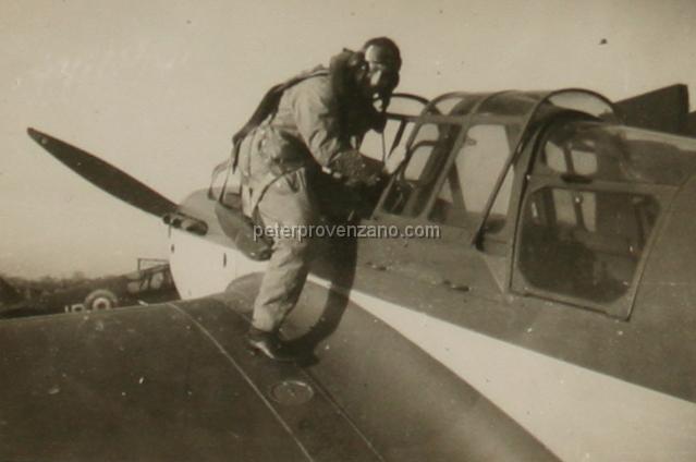 Peter Provenzano Photo Album Image_copy_033.jpg - "Dickie" Dickson (not listed on the 71st Eagle Squadron rolls) climbing into the cockpit of a Miles Master Mark IA trainer.  RAF Station Tern Hill, fall of 1940.